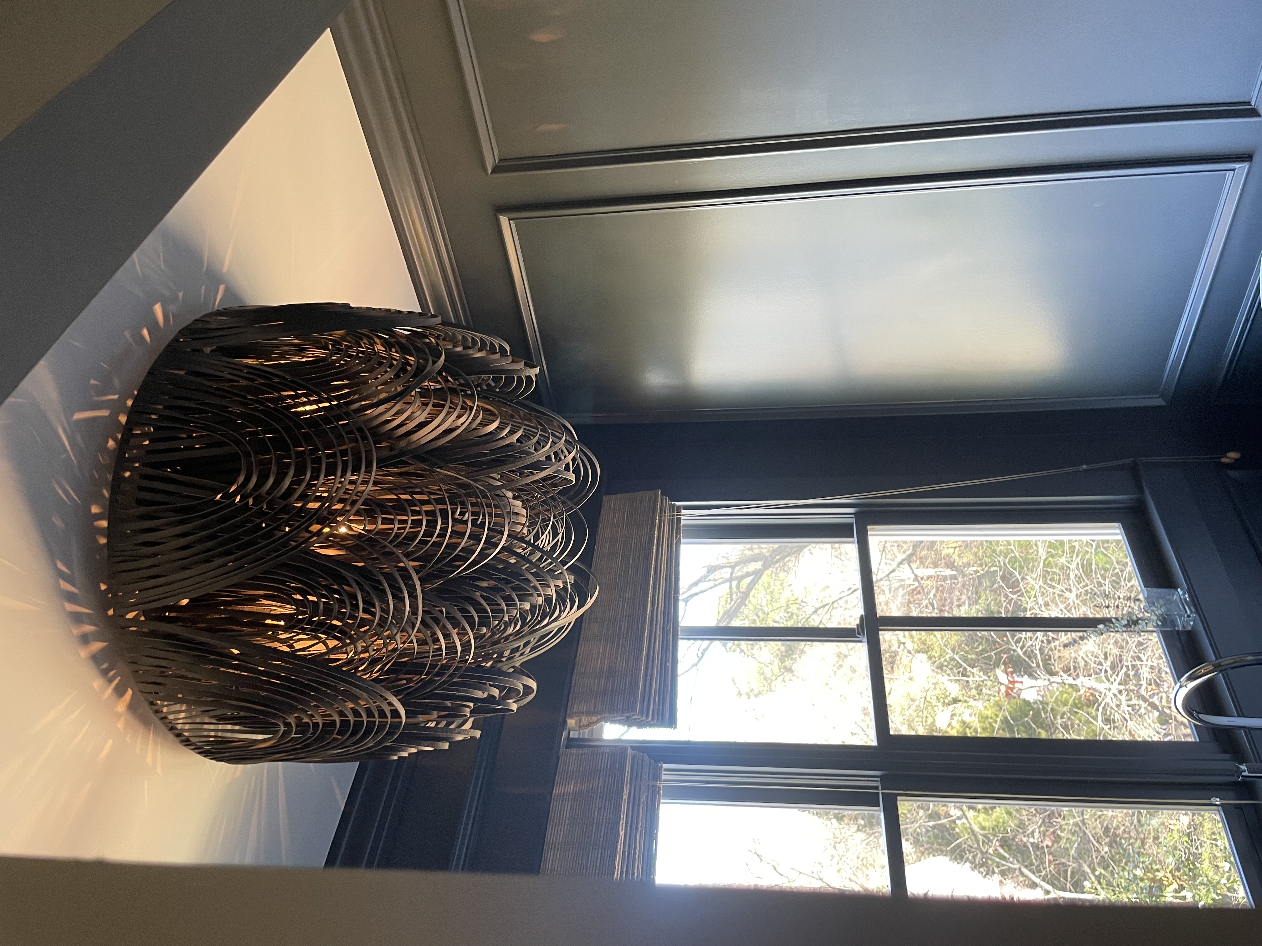 Custom chandelier installation in residential interior